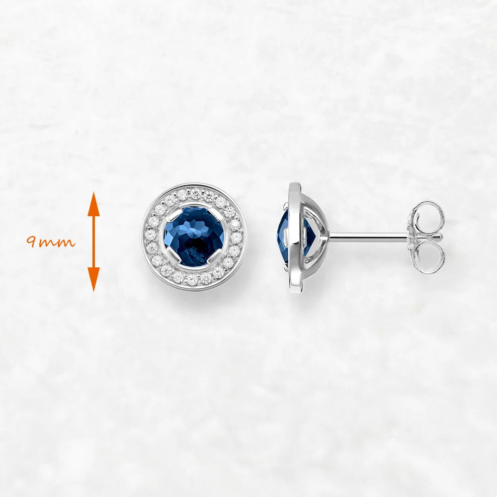 The Light of Luna Blue Ear Studs Earrings you're referring to seem to combine elegance with a touch of celestial charm. Here's a breakdown of what they might offer based on the description: